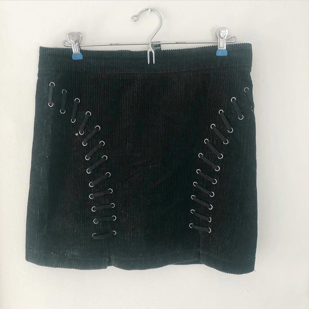 Black corduroy mini skirt with lace up detail
